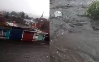 Desborda río en Tlalmanalco y alertan a automovilistas