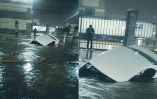 Cae vehículo en zanja durante inundación en Tultitlán